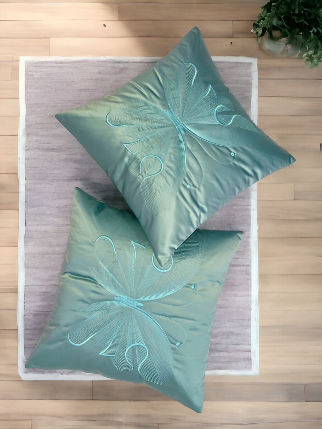 

Zikrak Exim Teal Green 5 Pieces Embroidered Satin Square Cushion Covers