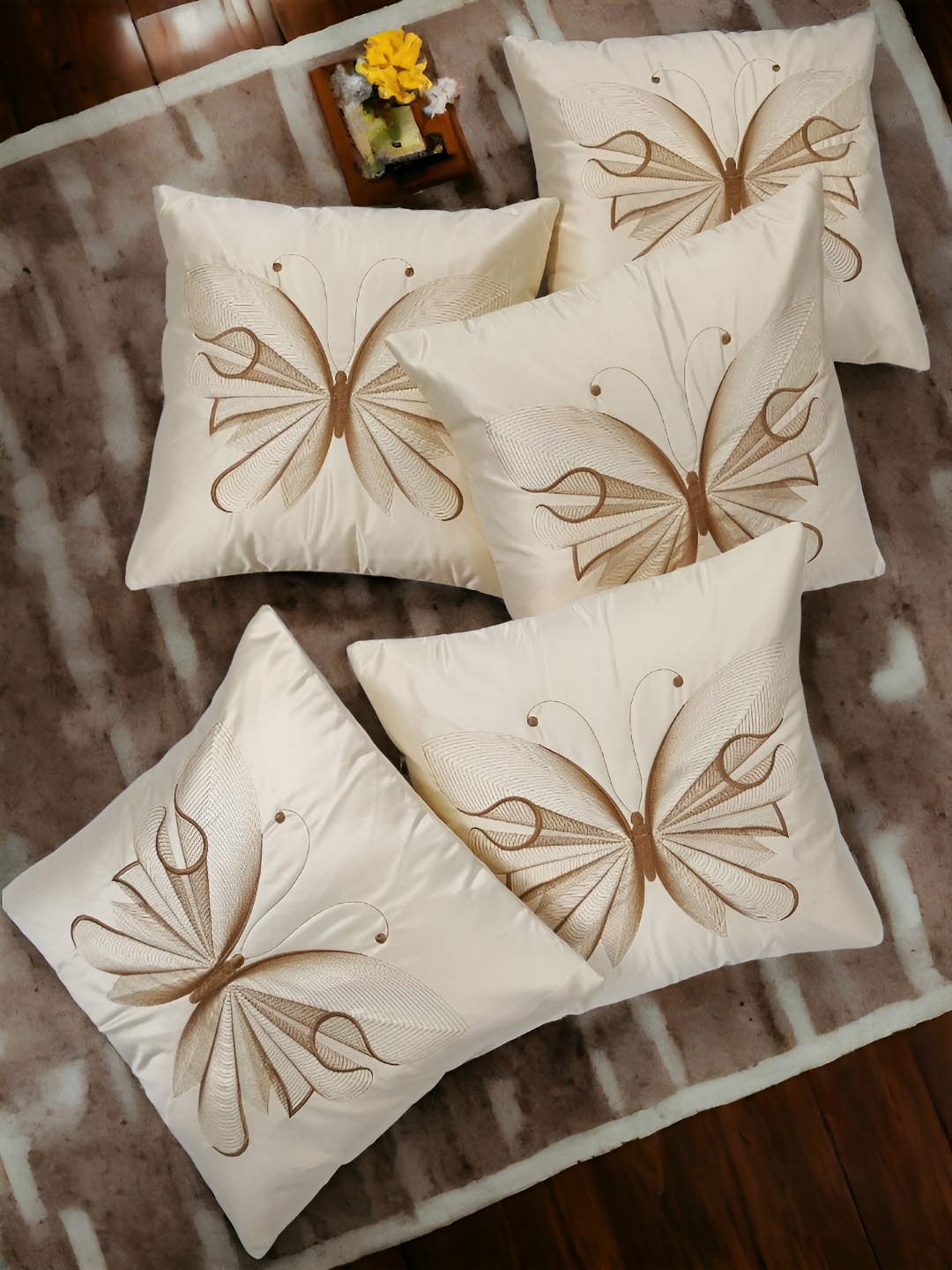 

Zikrak Exim Cream Coloured 5 Pieces Embroidered Satin Square Cushion Covers