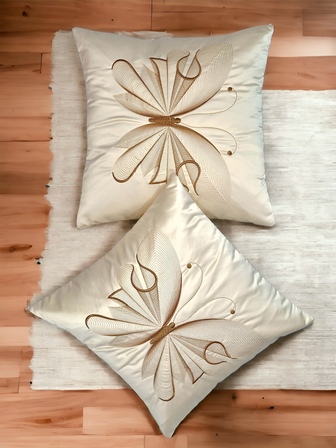 

Zikrak Exim Cream 2 Pieces Embroidered Satin Square Cushion Covers
