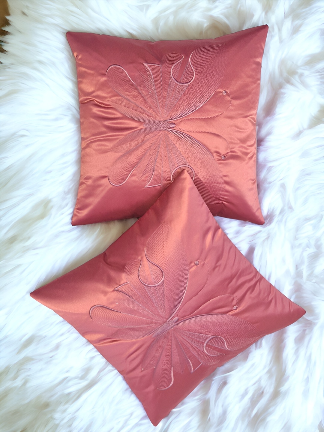 

Zikrak Exim Pink 2 Pieces Embroidered Satin Square Cushion Covers