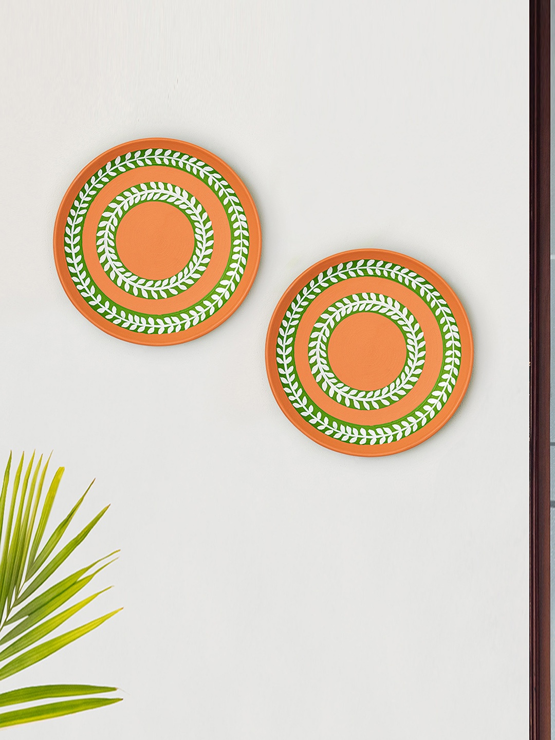 

ExclusiveLane Orange & Green 2 Pieces Leaf Spiral Design Terracotta Wall Plates