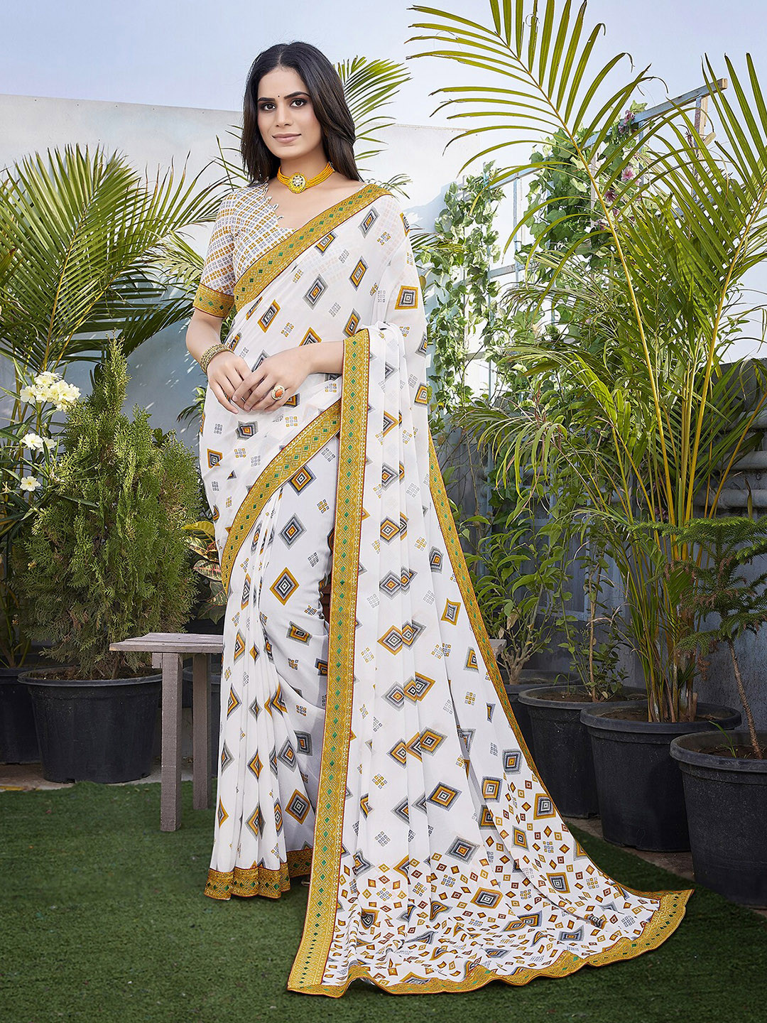 

MAGMINA Geometric Printed Pure Georgette Bandhani Saree, Yellow