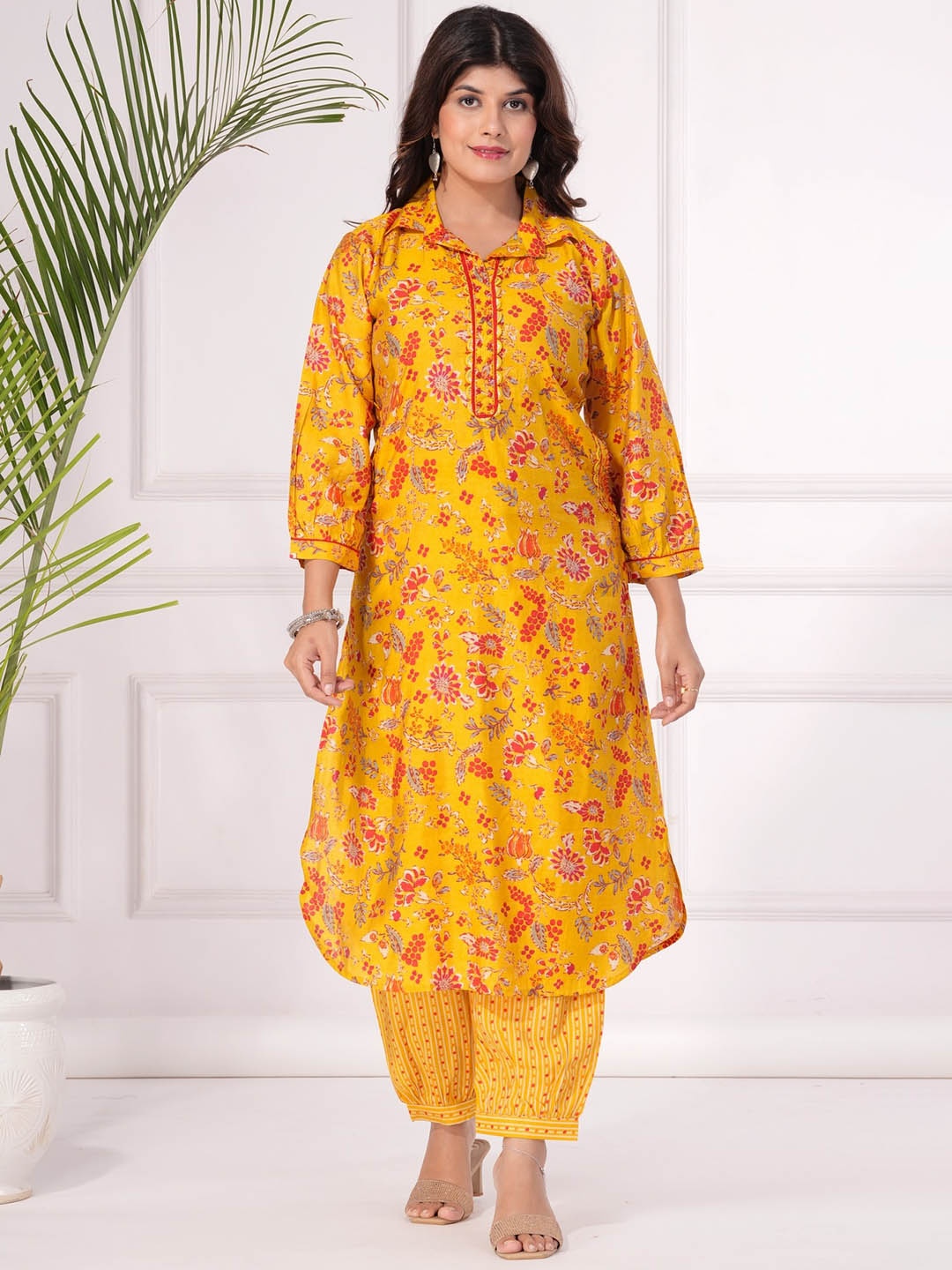

KALINI Women Floral Printed Regular Beads and Stones Kurta with Trousers, Yellow