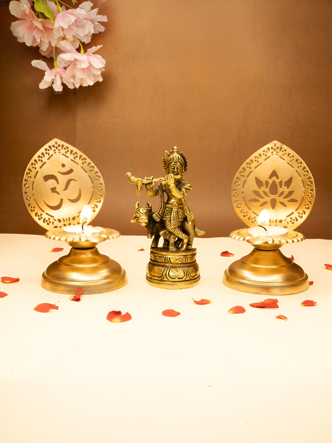 

Ekhasa Gold Toned 3 Pieces Pure Brass Lord Krishna Idol & Tealight Candle Holders