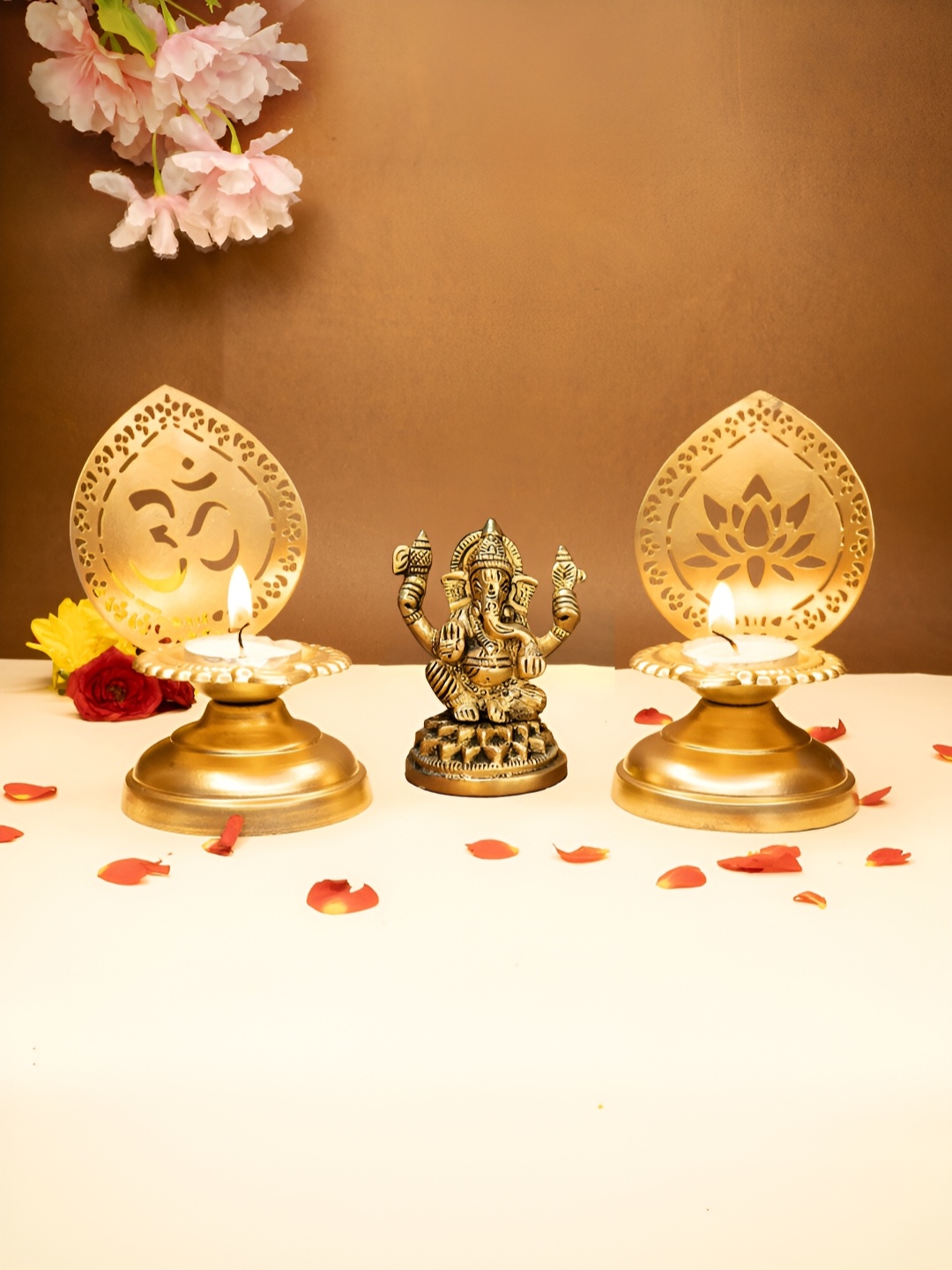 

Ekhasa Gold Toned 3 Pieces Pure Brass Ganesh Idol & Tealight Candle Holder Home Gift Set