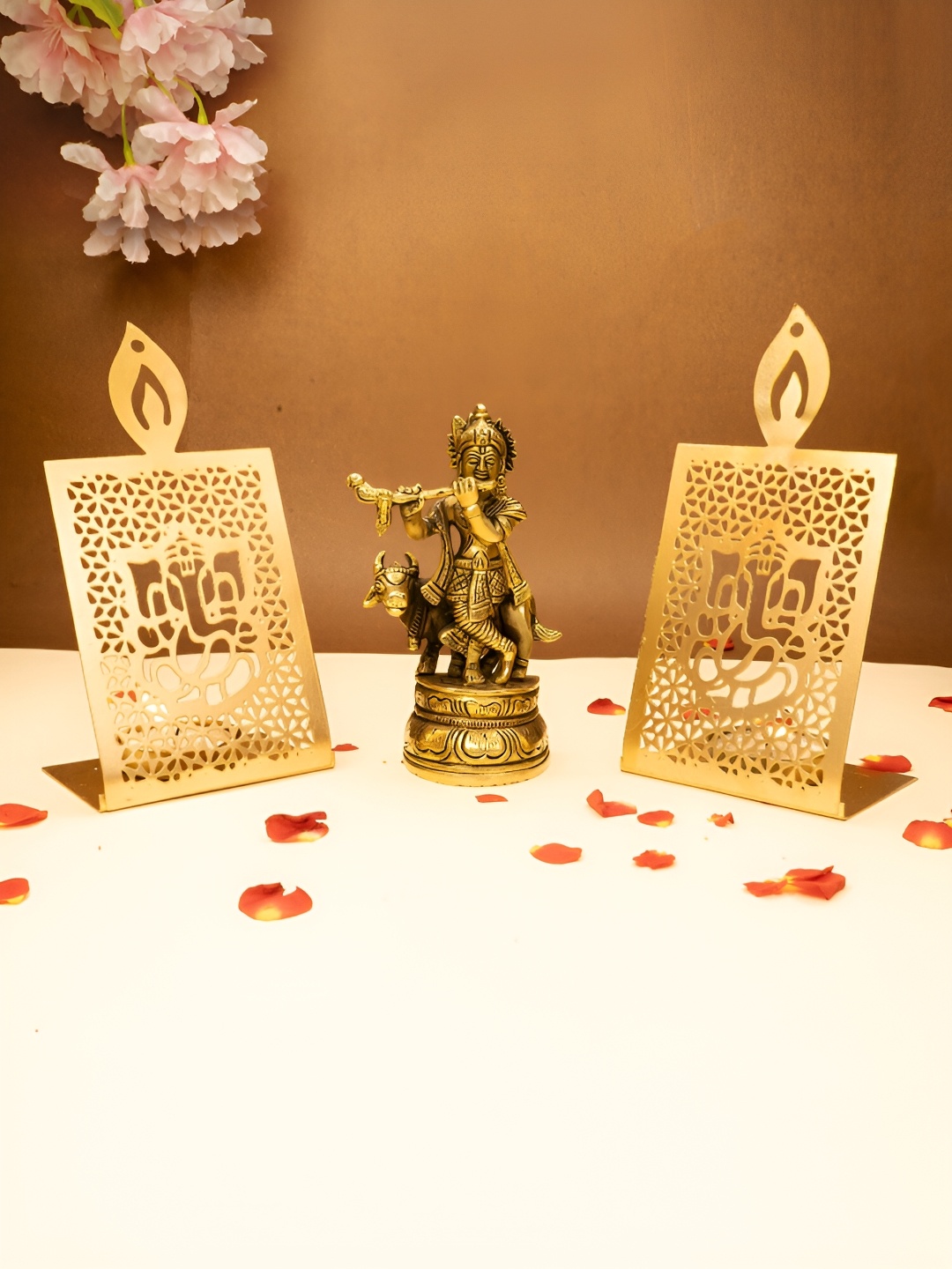

Ekhasa Gold Toned 3 Pieces Pure Brass Lord Krishna Idol & Tealight Candle Holders