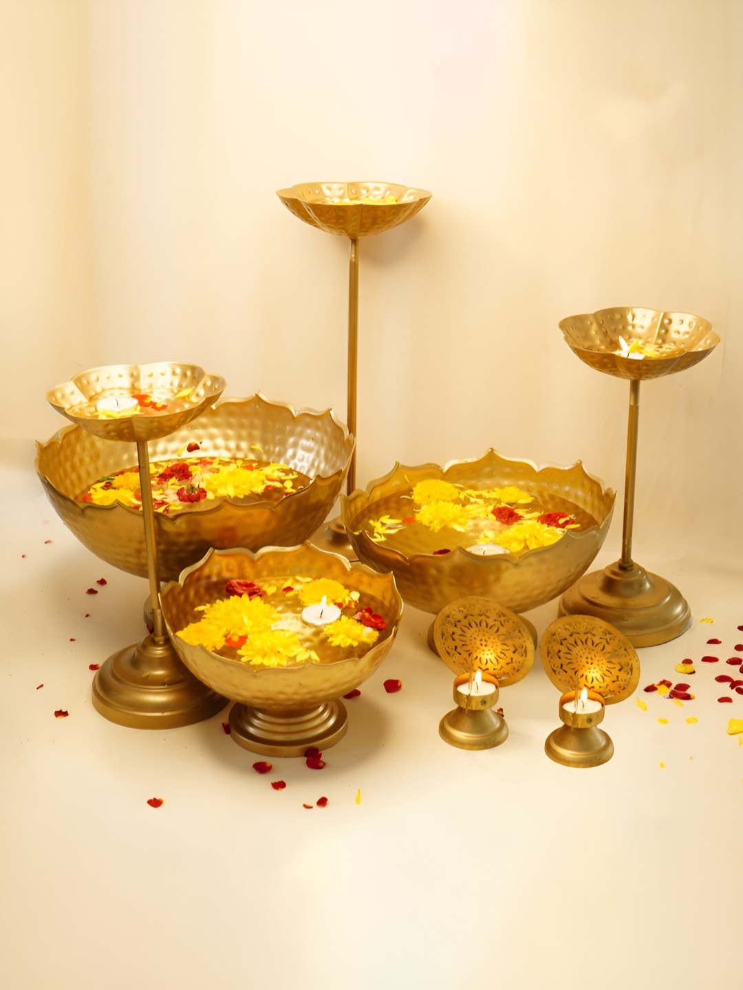 

Ekhasa Gold Toned 8 Pieces Urli Decoration Bowl & Tealight Candle Holders