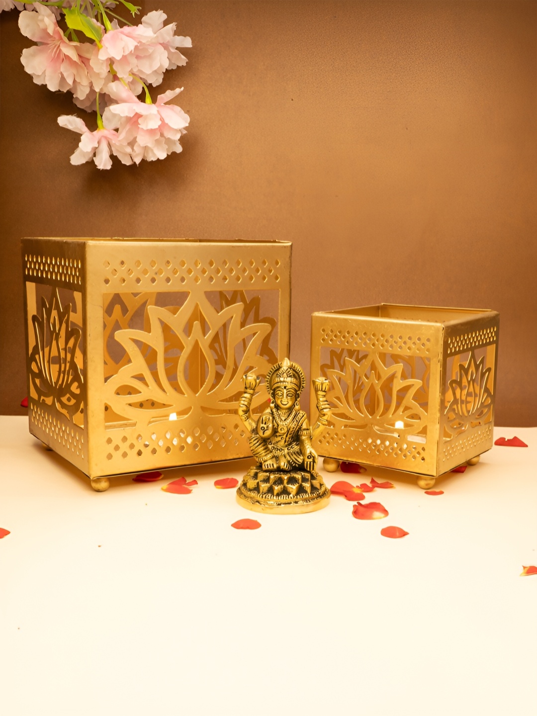 

Ekhasa Gold Toned 3 Pieces Textured Lakshmi Devi Idol & Tealight Candle Holders