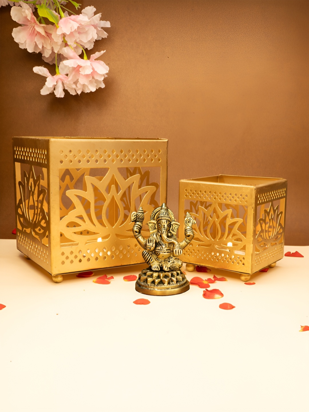 

Ekhasa Gold Toned 3 Pieces Textured Ganesh Idol & Tealight Candle Holders