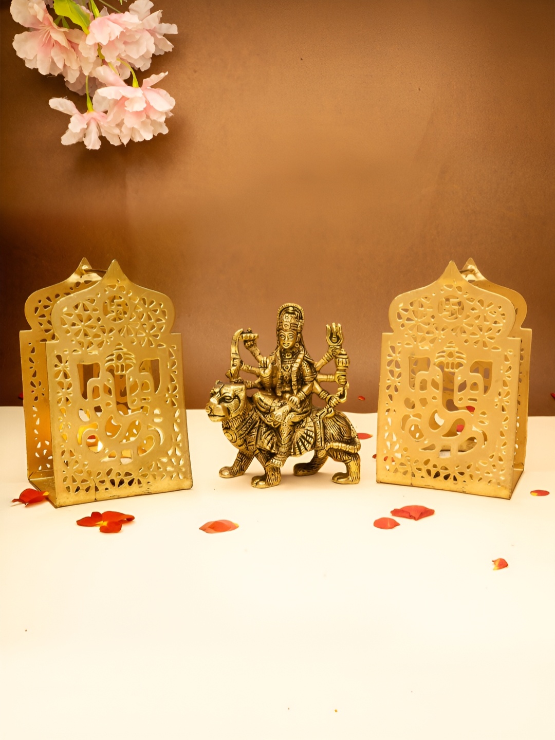 

Ekhasa Gold Toned 3 Pieces Textured Durga Maa Idol & Tealight Candle Holders