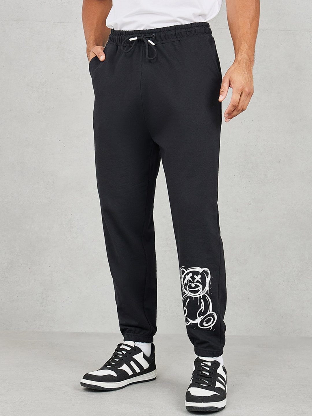 

Styli Men Teddy Print Oversized Mid-Rise Pure Cotton Terry Joggers, Black