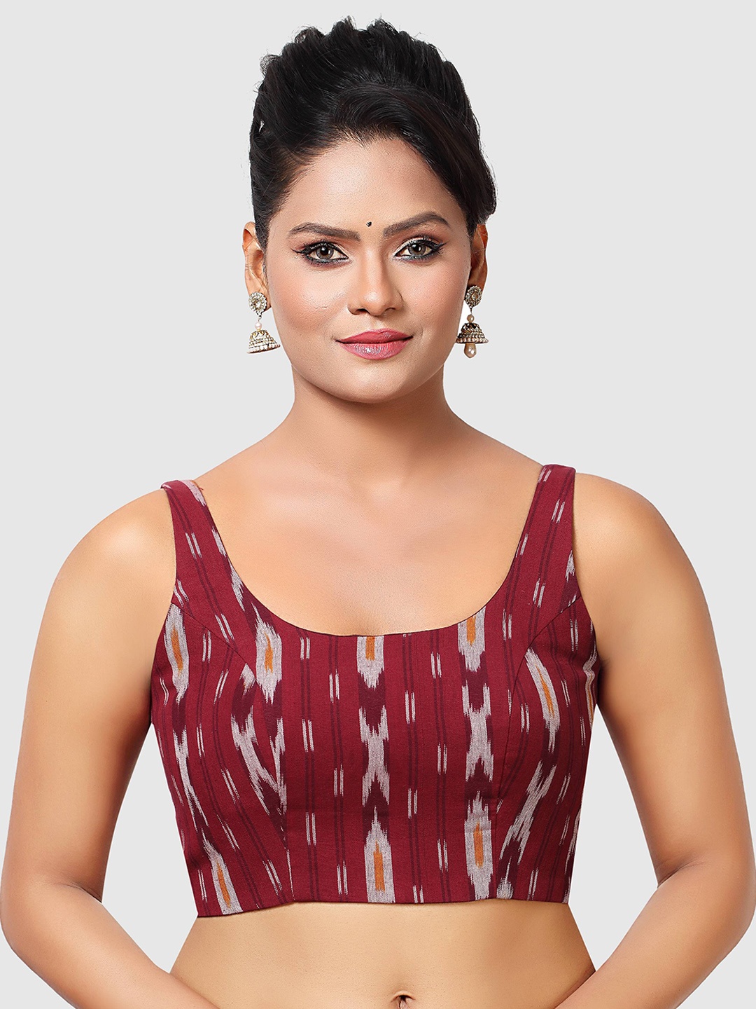 

Madhu Fashion Ikat Printed Padded Sleeveless Readymade Cotton Saree Blouse, Maroon