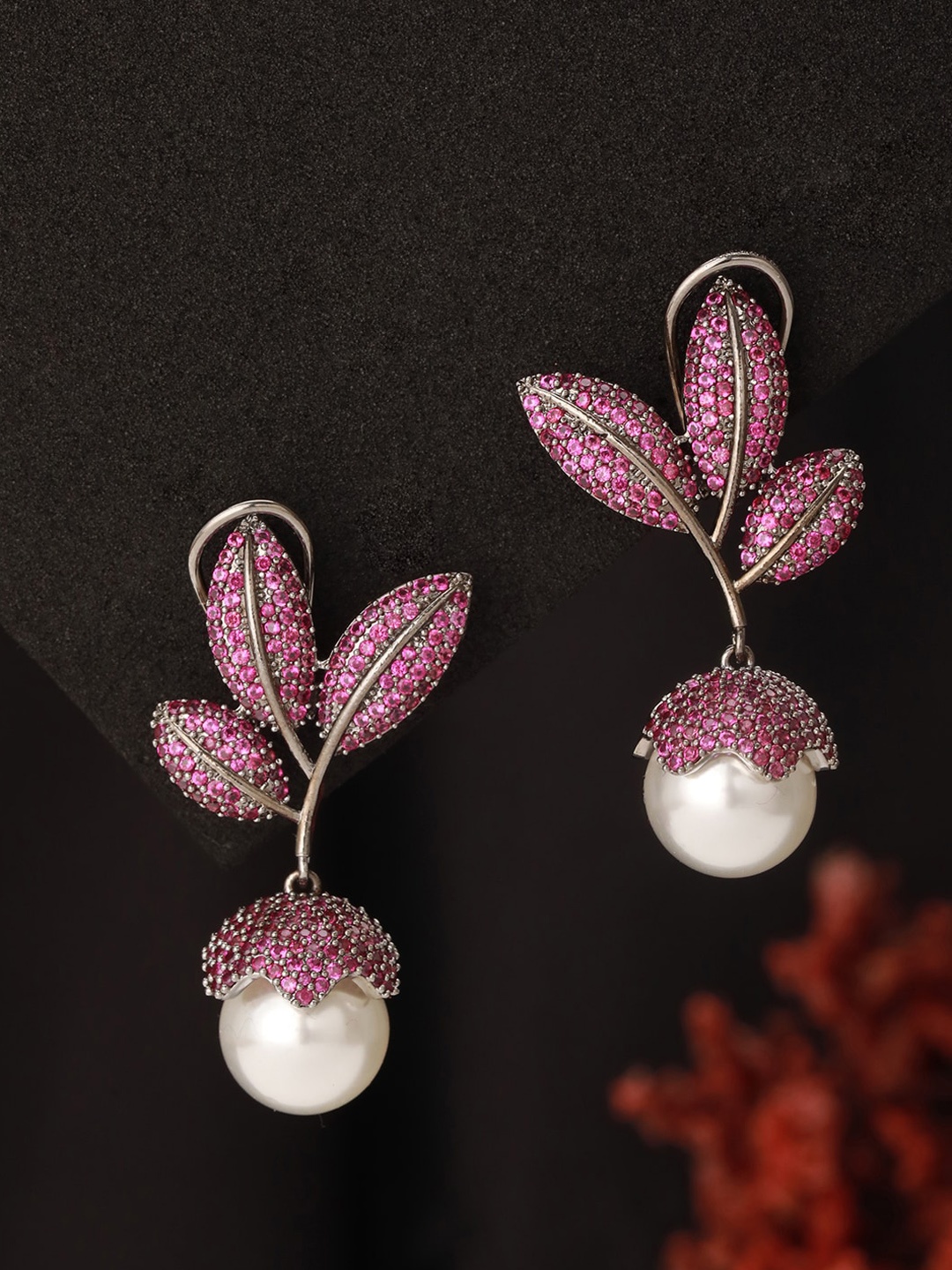 

Saraf RS Jewellery Silver Plated Red AD & Pearl Studded Luxe Floral Designer Earrings