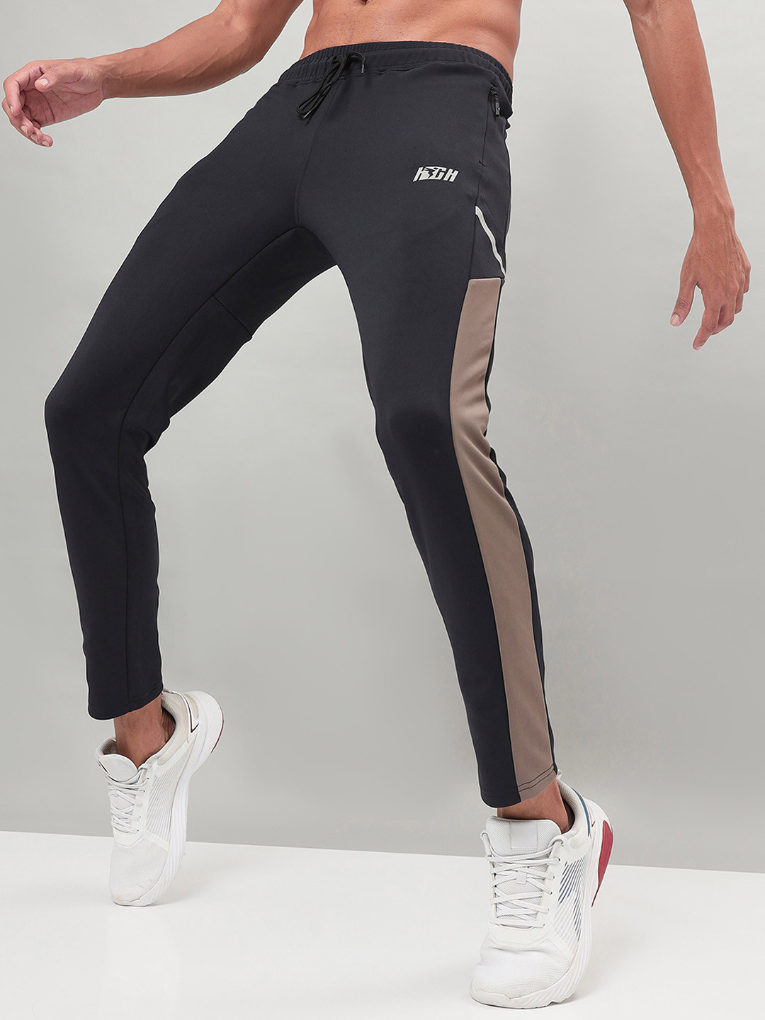 

Technosport Men SS'24 Colourblocked Slim-Fit Mid-Rise Antimicrobial Track Pants, Black