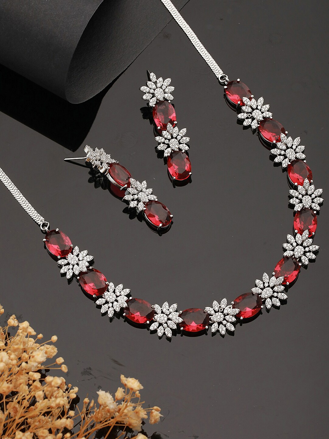 

Saraf RS Jewellery Silver Plated Red ADStudded Designer Floral Design Jewellry Set