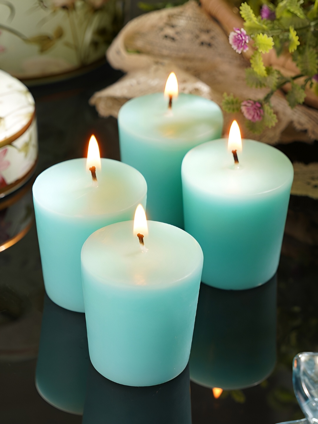 

Pure Home and Living Blue 4 Pieces Sea Breeze Votive Pillar Candle