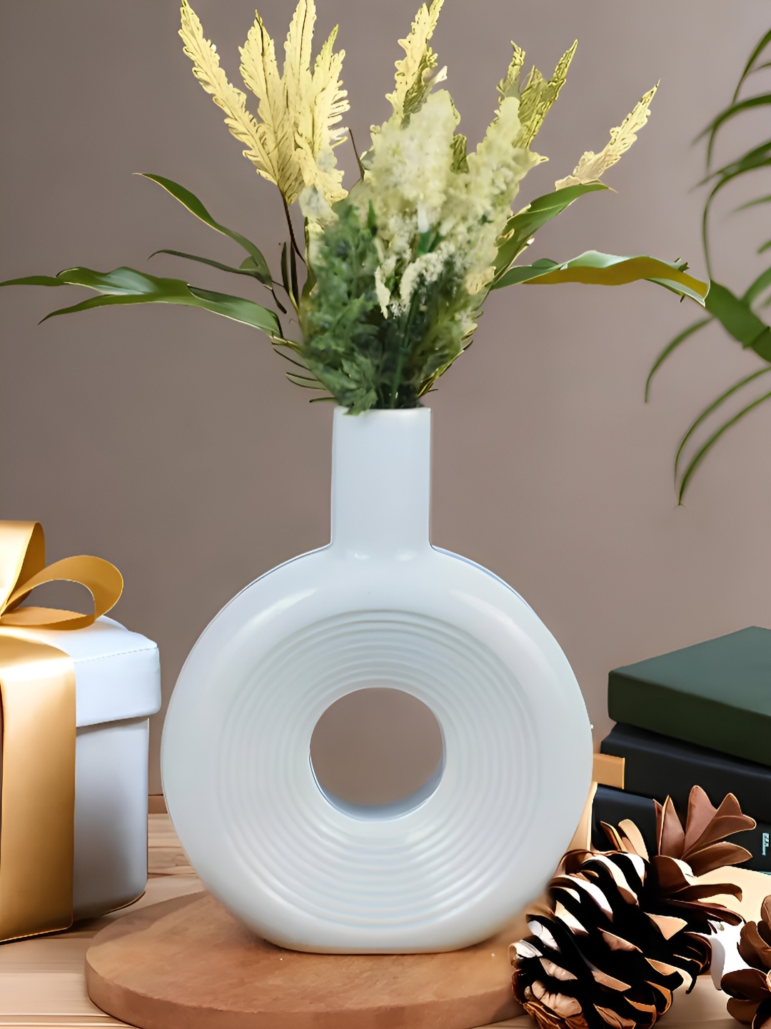 

Kaolinite Off White Donut Shaped Ceramic Flower Vase