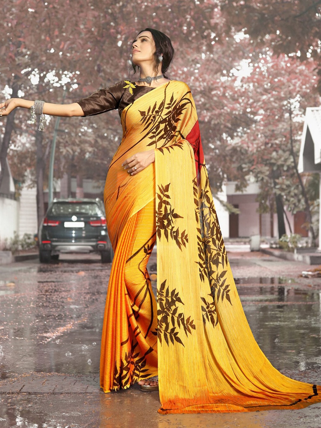 

Mitera Ethnic Motifs Printed Saree, Yellow