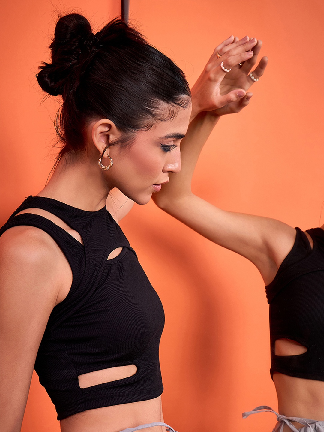 

Uptownie Sleeveless Stretchable Ribbed Top with Front Cut Outs, Black