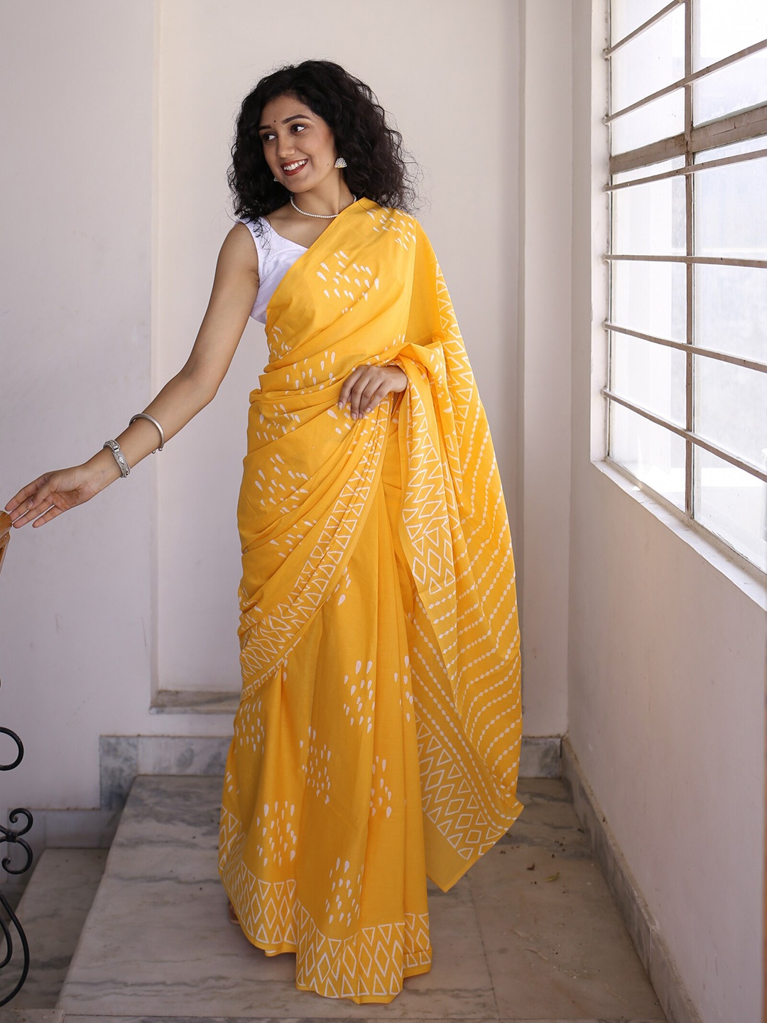 

Moora Ethnic Motifs Printed Pure Cotton Bagru Saree, Yellow