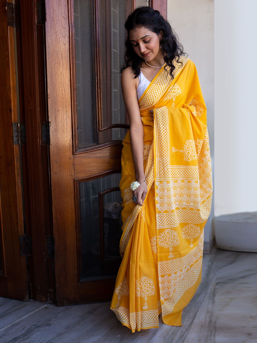 

Moora Ethnic Motifs Printed Pure Cotton Bagru Saree, Yellow