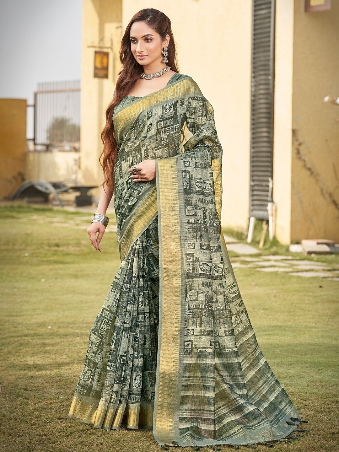 

Vishudh Green Printed Zari Saree