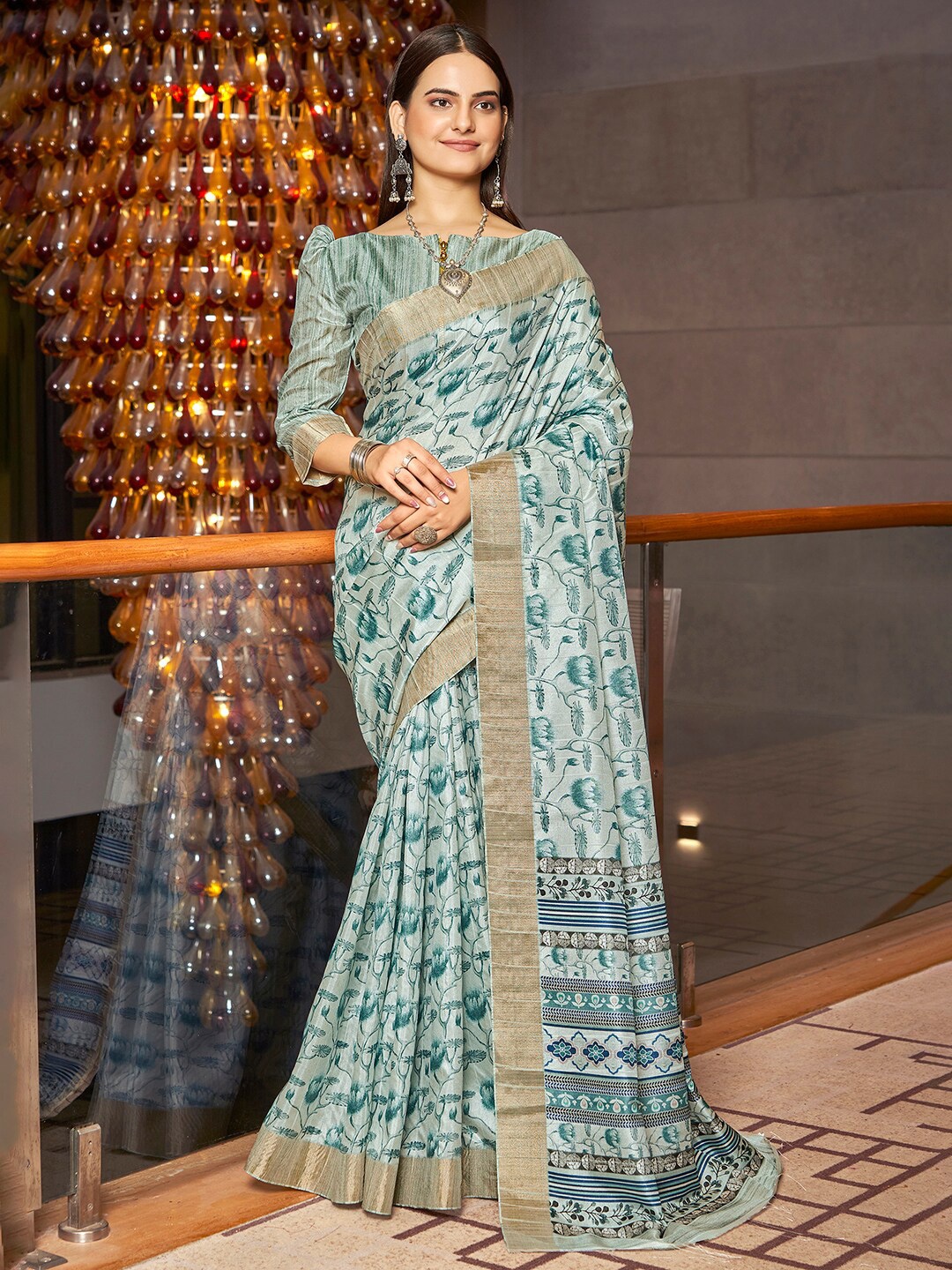 

Vishudh Abstract Printed Zari Saree, Teal