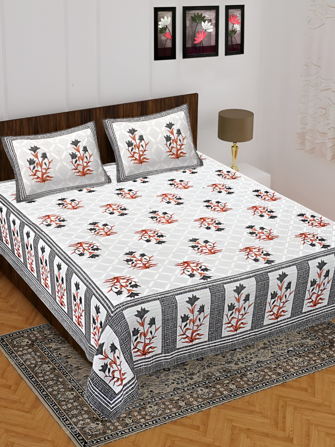 

UNIBLISS Orange & White Floral 144 TC Cotton Queen Bedsheet with 2 Pillow Covers