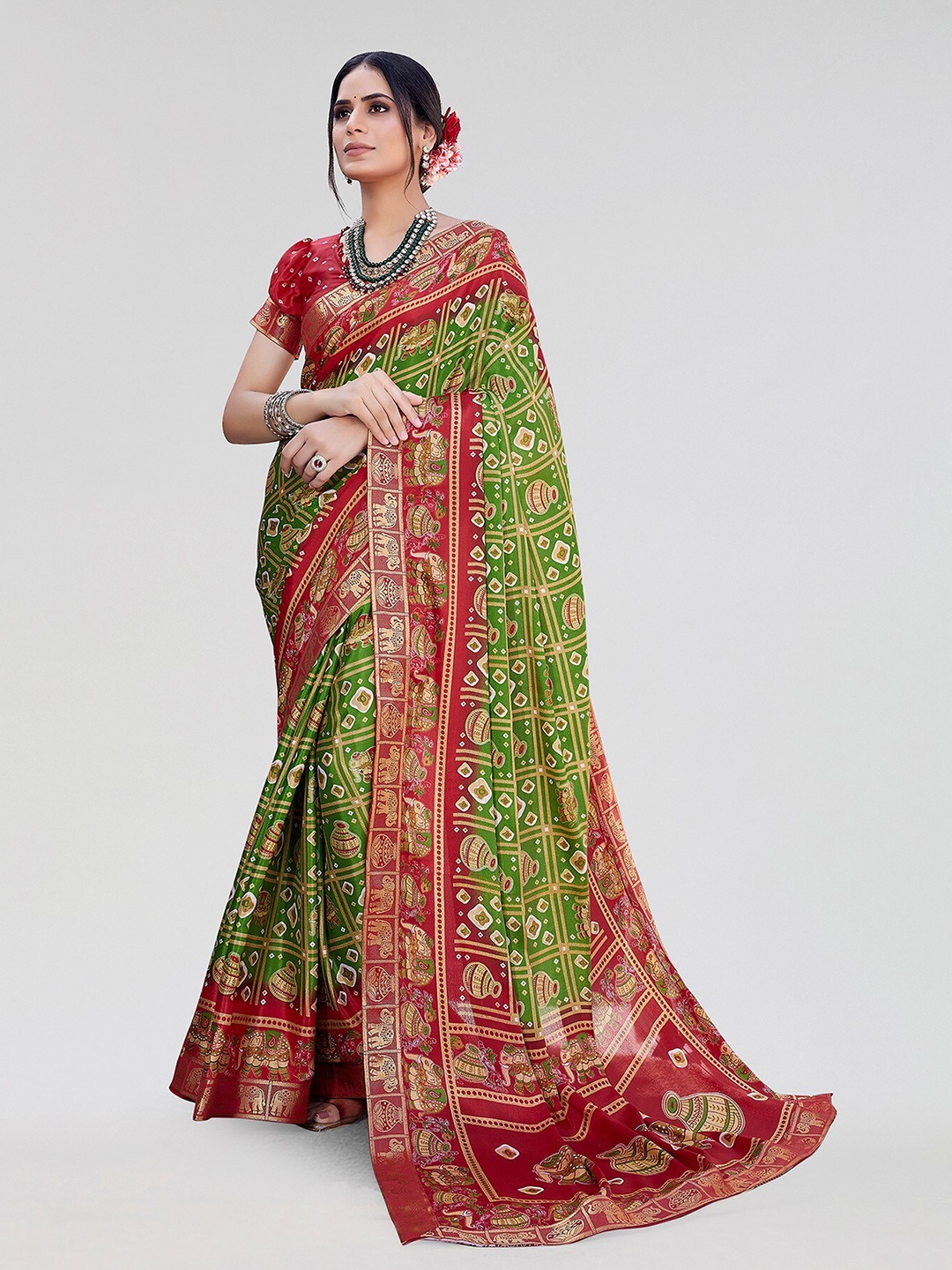 

Yashika Ethnic Motifs Zari Silk Blend Patola Saree, Red
