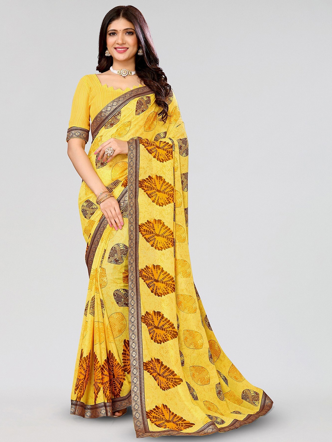 

Yashika Ethnic Motifs Printed Saree, Yellow