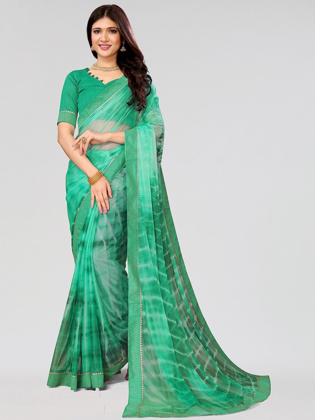 

Yashika Printed Leheriya Saree, Green