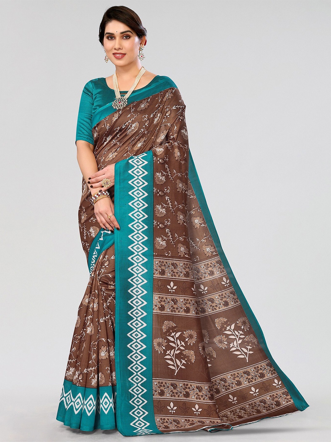

Yashika Floral Printed Saree, Teal