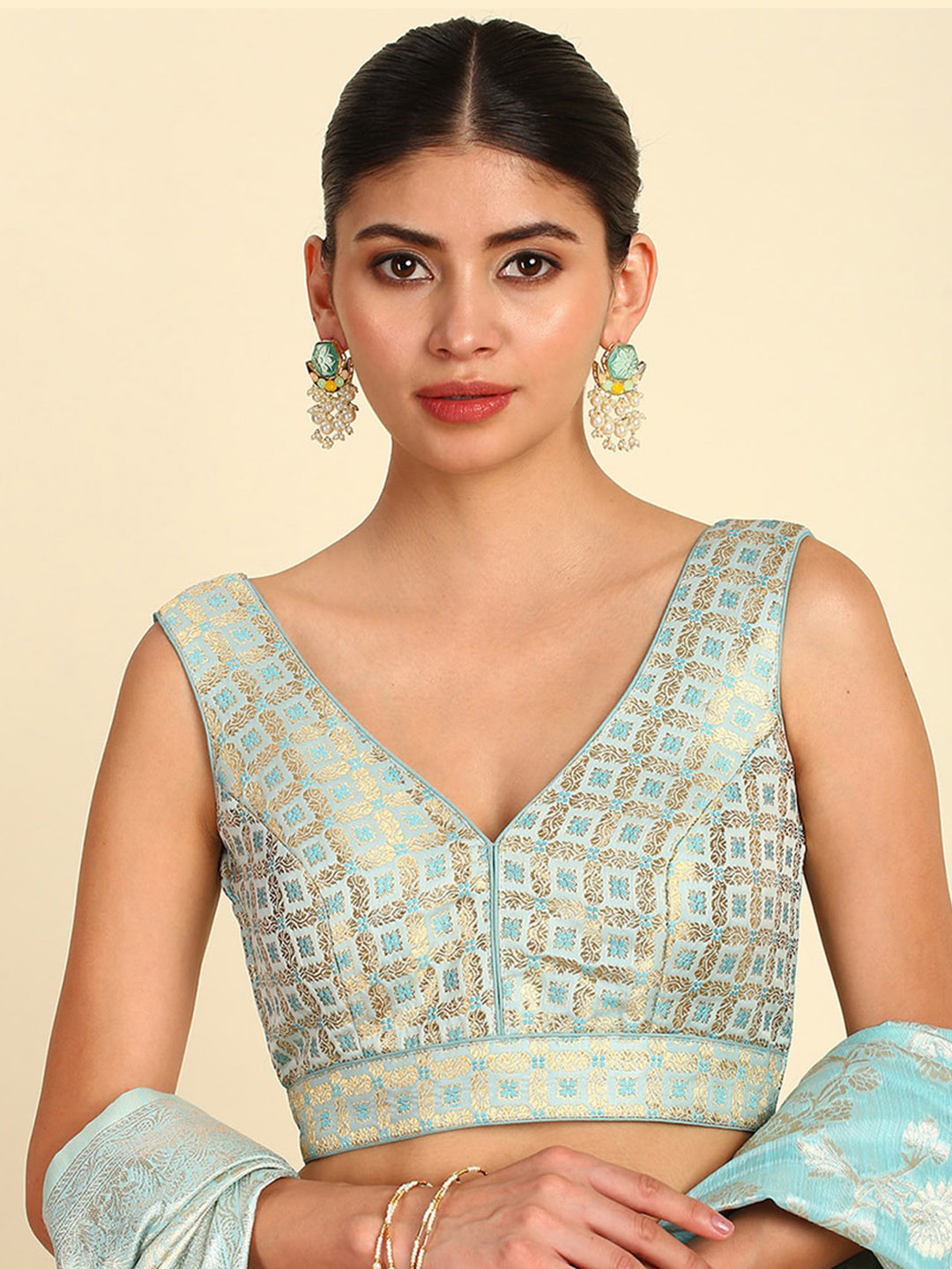 

Soch Blue Ethnic Motifs Woven Design Plunge Neck Sleeveless Padded Saree Blouse