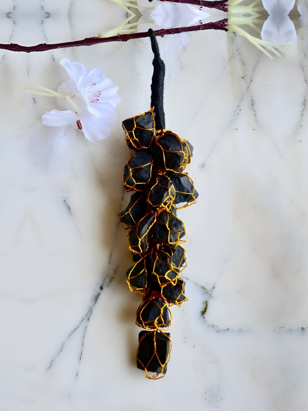 

Shubhanjali Black Tourmaline Raw Hanging, Blue