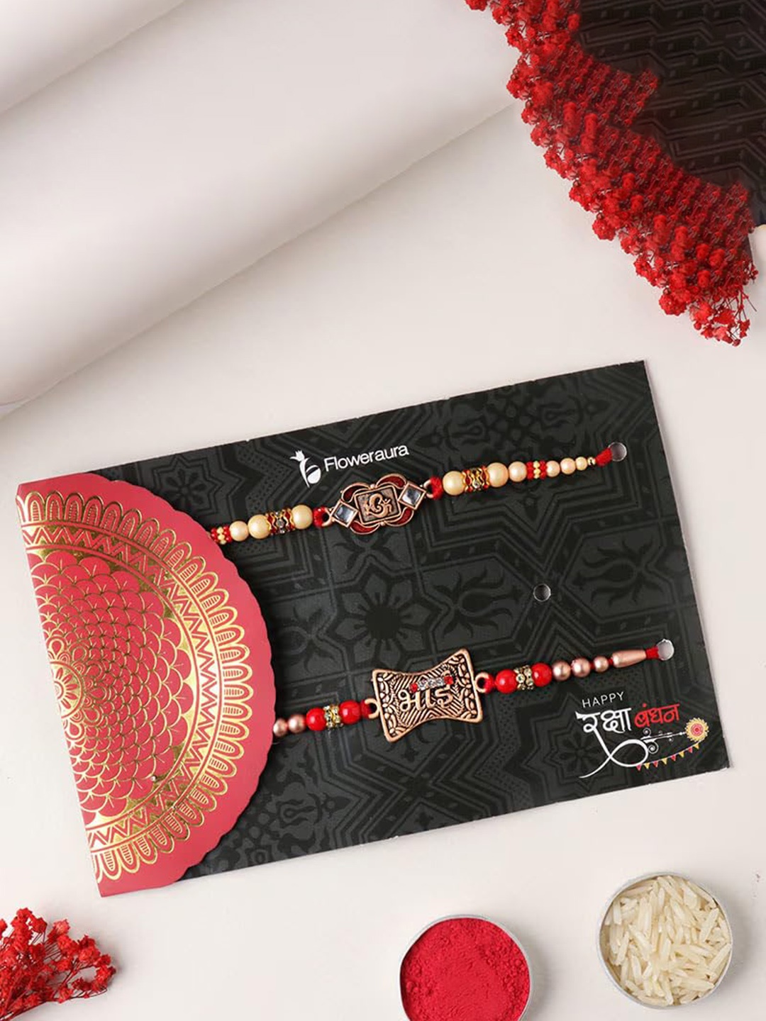 

Floweraura Men Set Of 2 Divine Ganesha & Bhai Rakhis with Roli & Chawal, Red