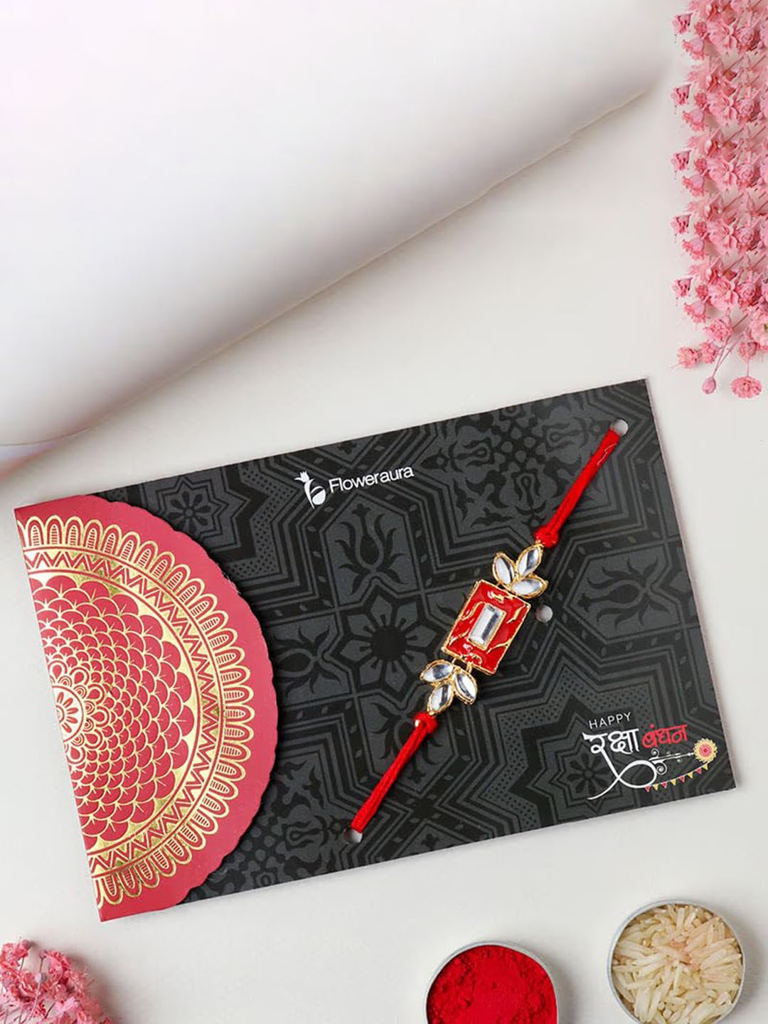 

Floweraura Stone Studded Rakhi with Roli & Chawal, Red