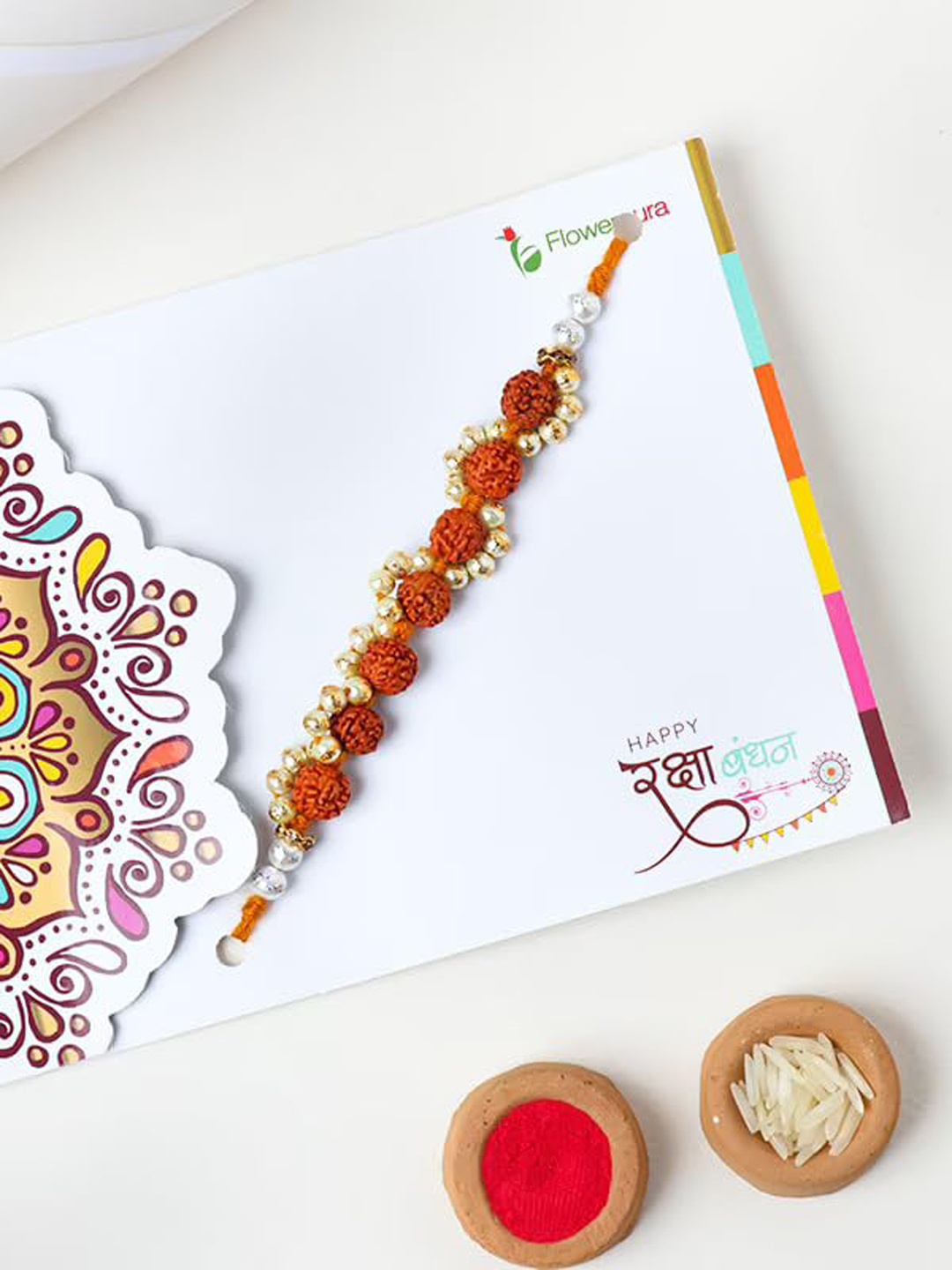 

Floweraura Men Rudraksh & Pearl Rakhi With Roli & Chawal, Gold