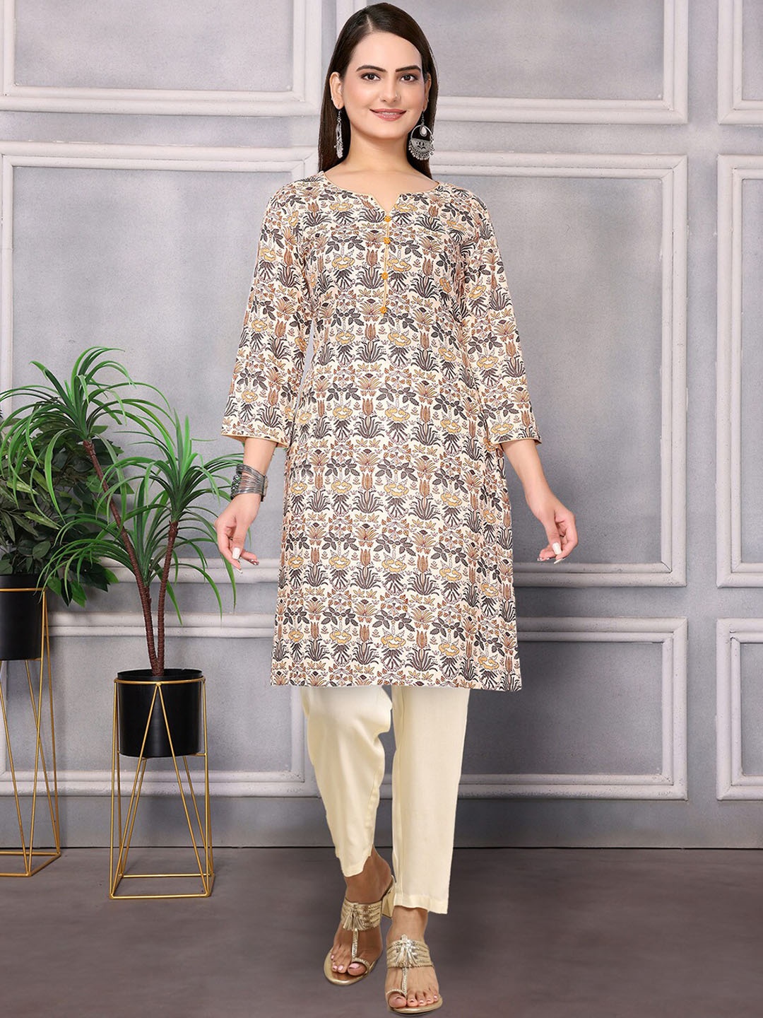 

Rangita Ethnic Motifs Printed Regular Kurta With Trousers, Cream