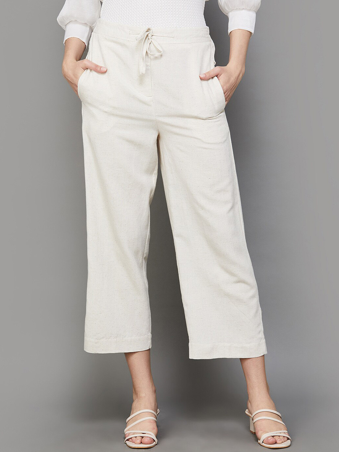 

CODE by Lifestyle Women Regular Fit Mid-Rise Plain Trousers, Beige