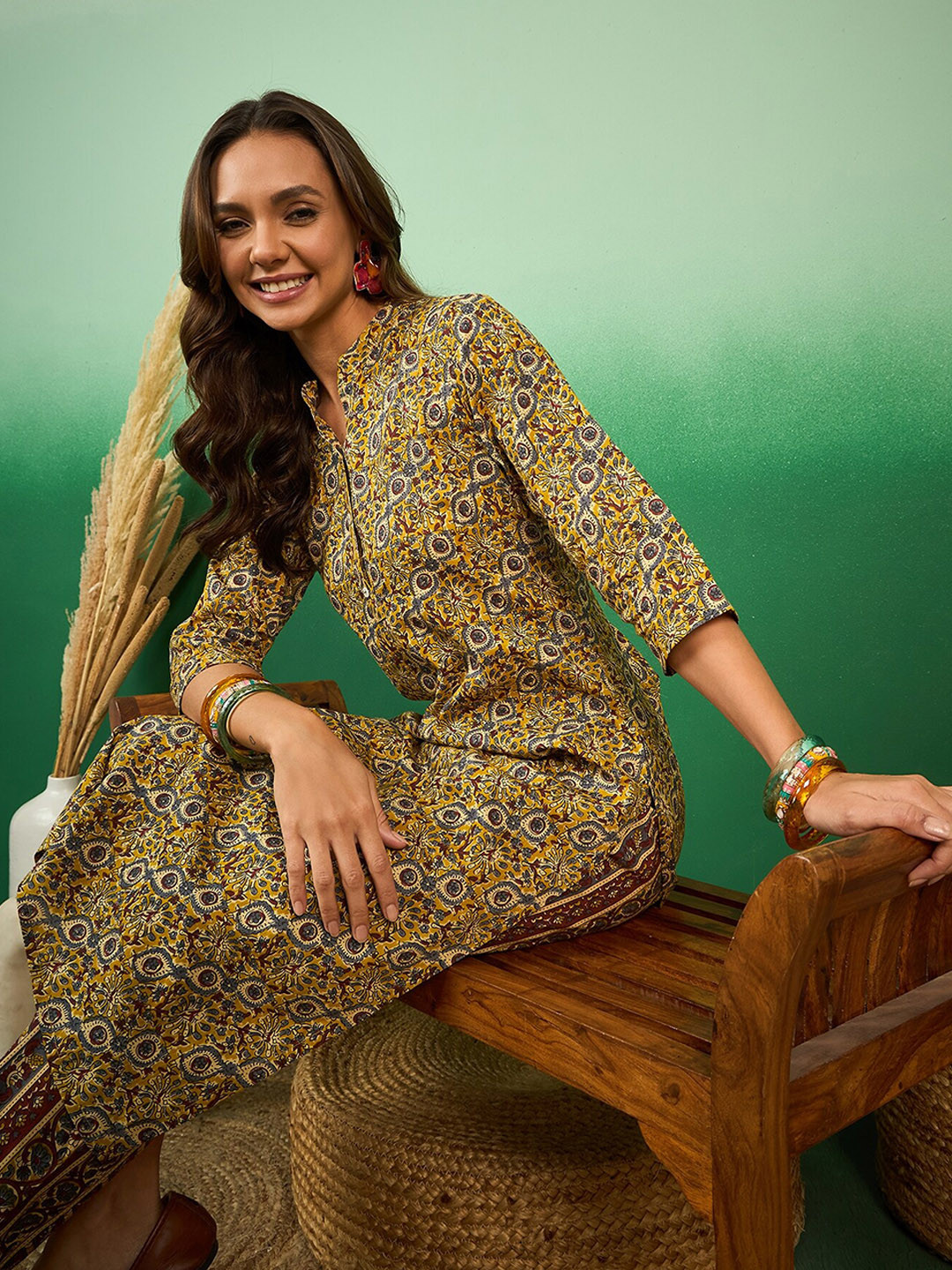 

Sangria Kalamkari Floral Printed Straight Kurta With Trousers, Yellow