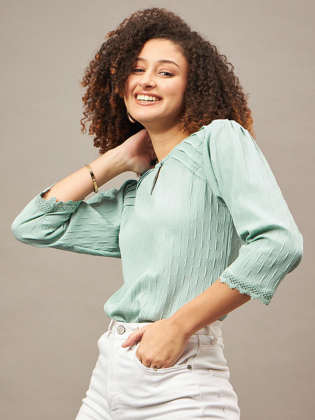 

The Roadster Lifestyle Co Sea Green Self Design Lace Inserts Pleated Detail Blouson Top