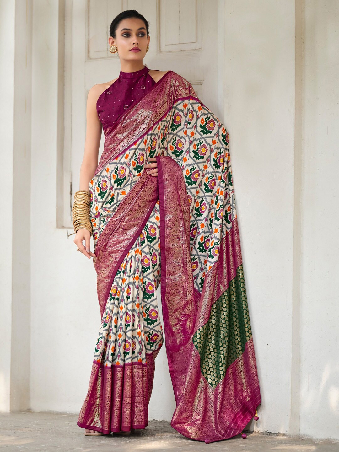 

Saree mall Cream Coloured Ethnic Motifs Printed Zari Patola Saree