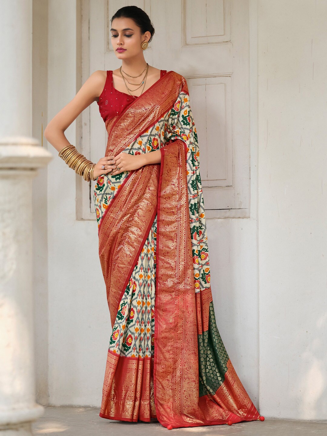 

Saree mall Cream Coloured Ethnic Motifs Printed Zari Patola Saree