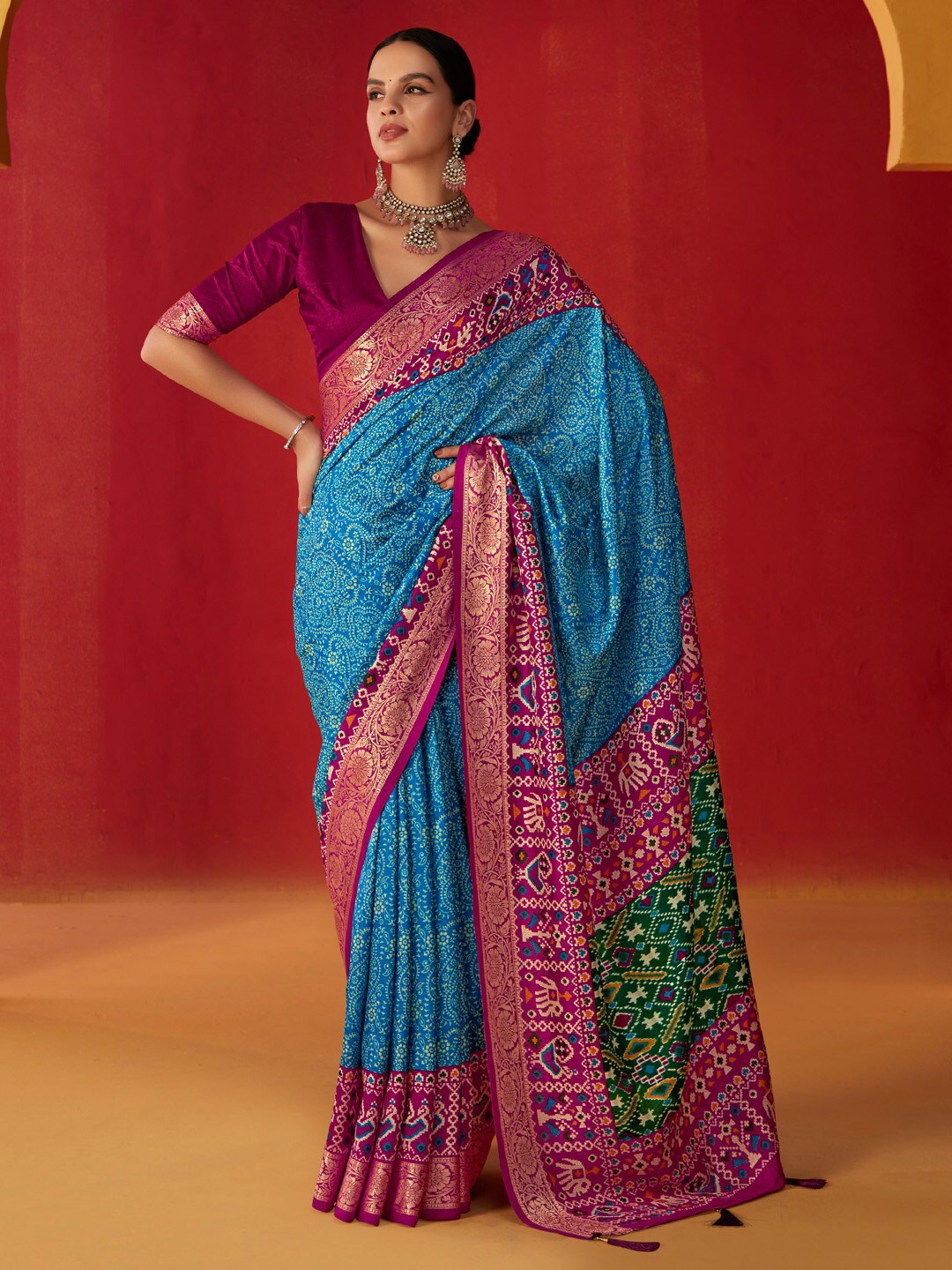 

Saree mall Blue Ethnic Motifs Zari Patola Saree