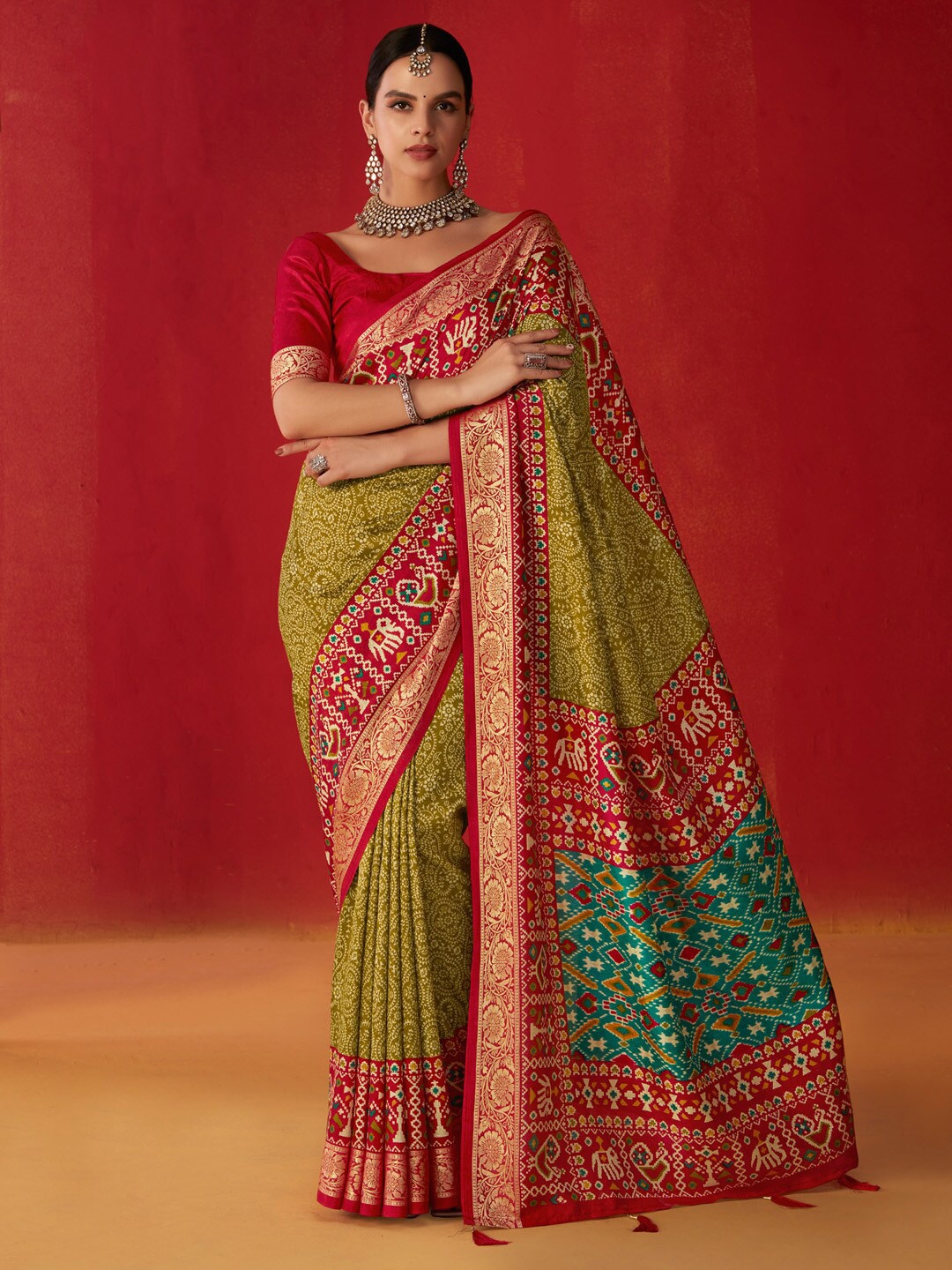 

Saree mall Olive Ethnic Woven Design Zari Patola Saree