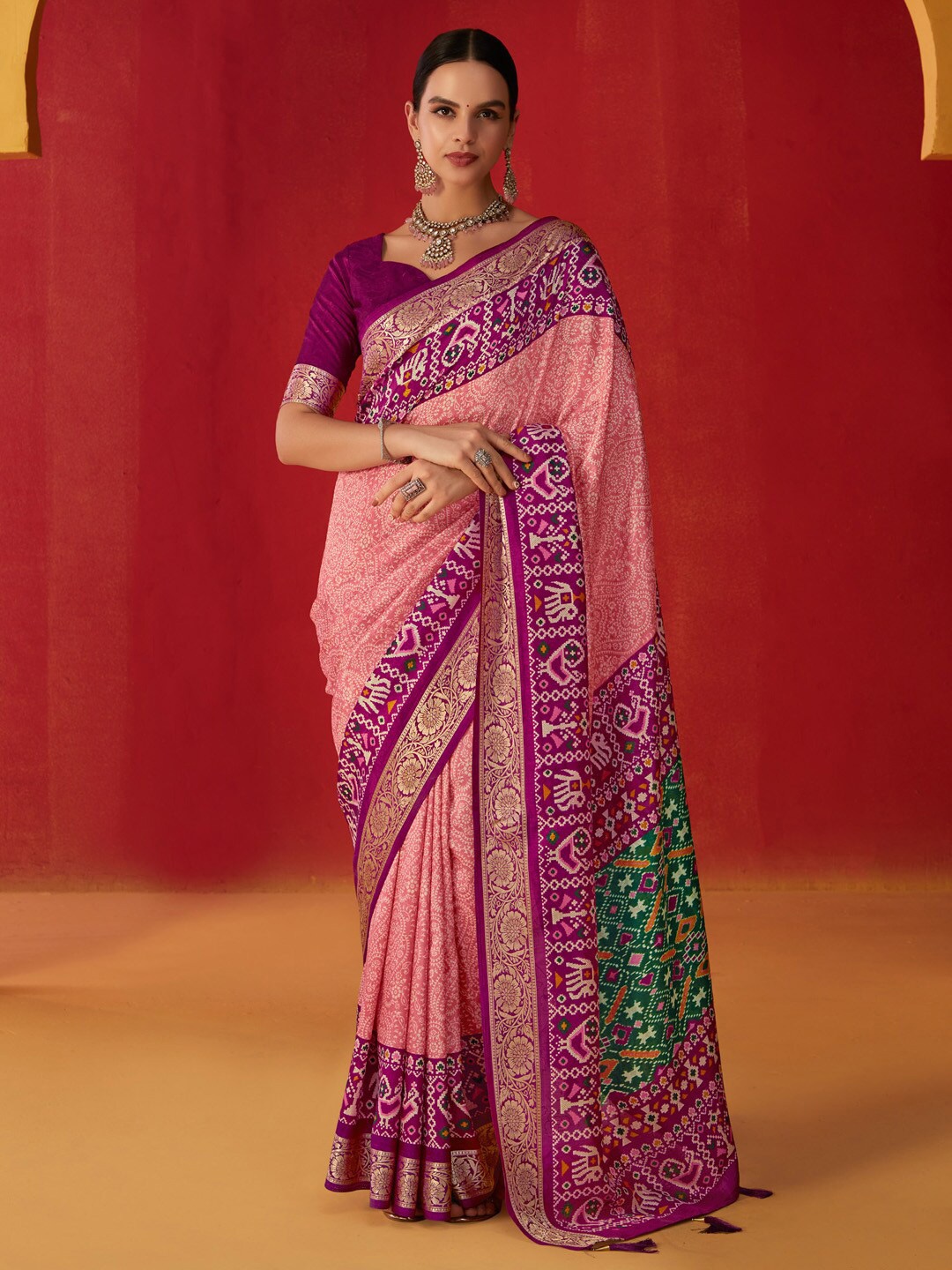 

Saree mall Rose Gold Ethnic Motifs Zari Patola Saree