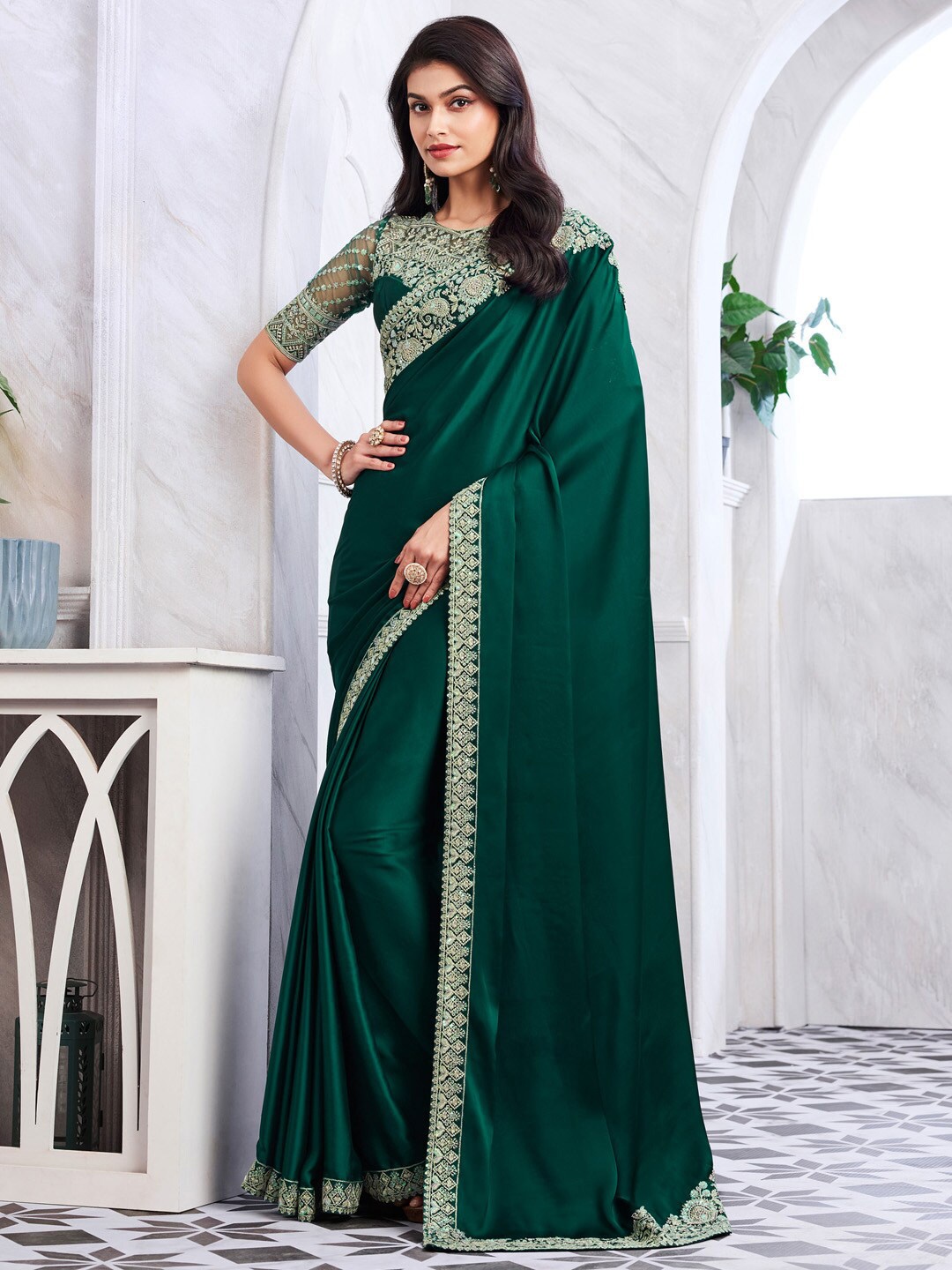 

Mitera Green Embellished Sequinned Satin Saree
