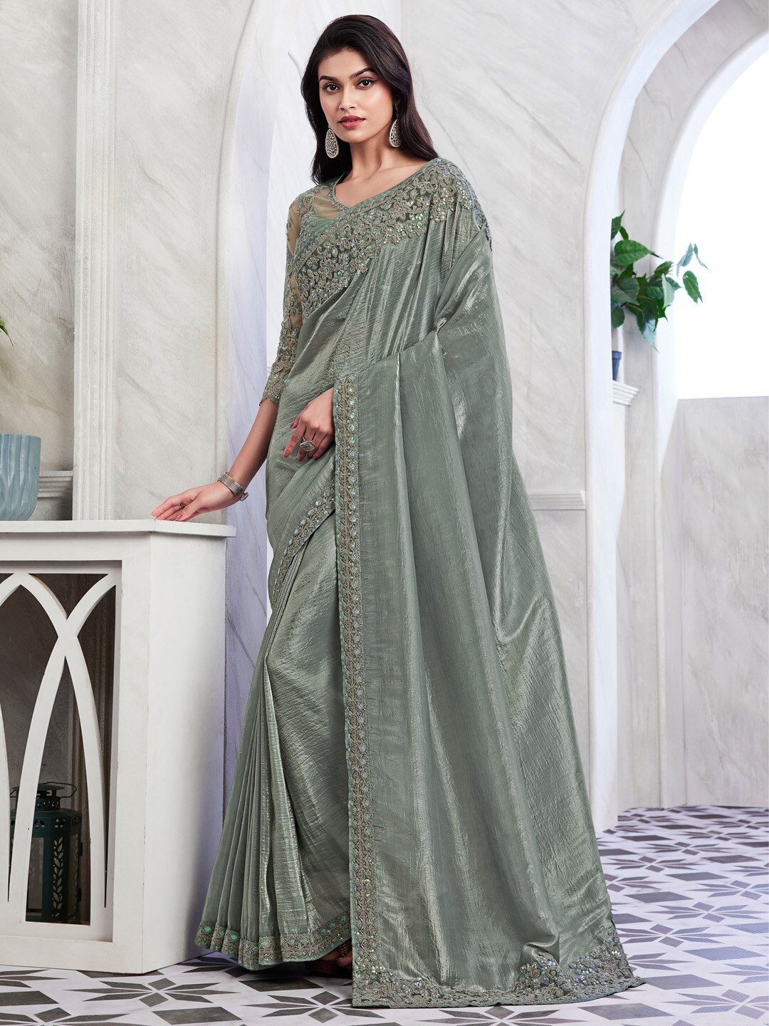 

Mitera Sea Green Embellished Sequinned Poly Georgette Saree