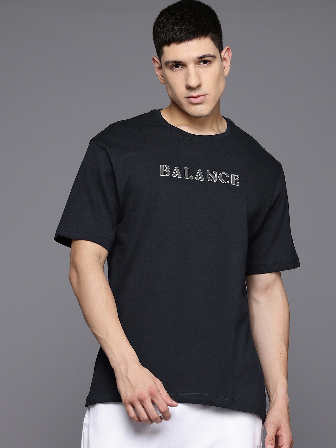 

HRX by Hrithik Roshan Pure Cotton Printed Drop-Shoulder Sleeves Yoga T-shirt, Black