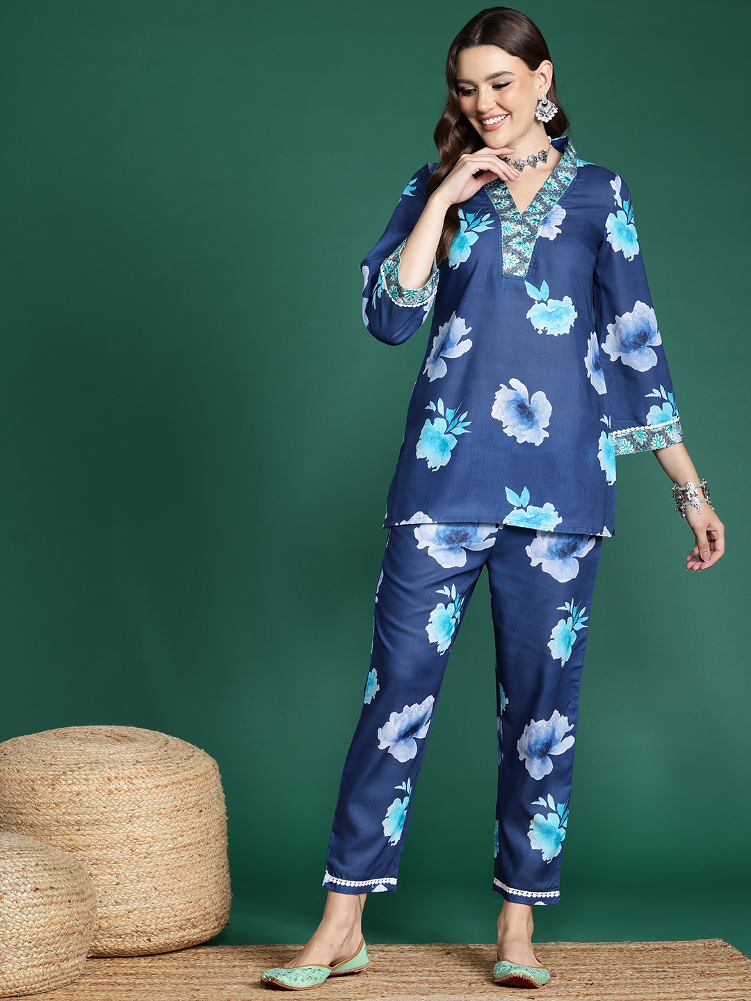 

Sangria Women Floral Printed Regular Kurti with Trousers, Navy blue